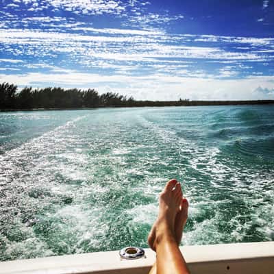 An image of a guest relaxing on a Ocean Fox adventure in the Bahamas.